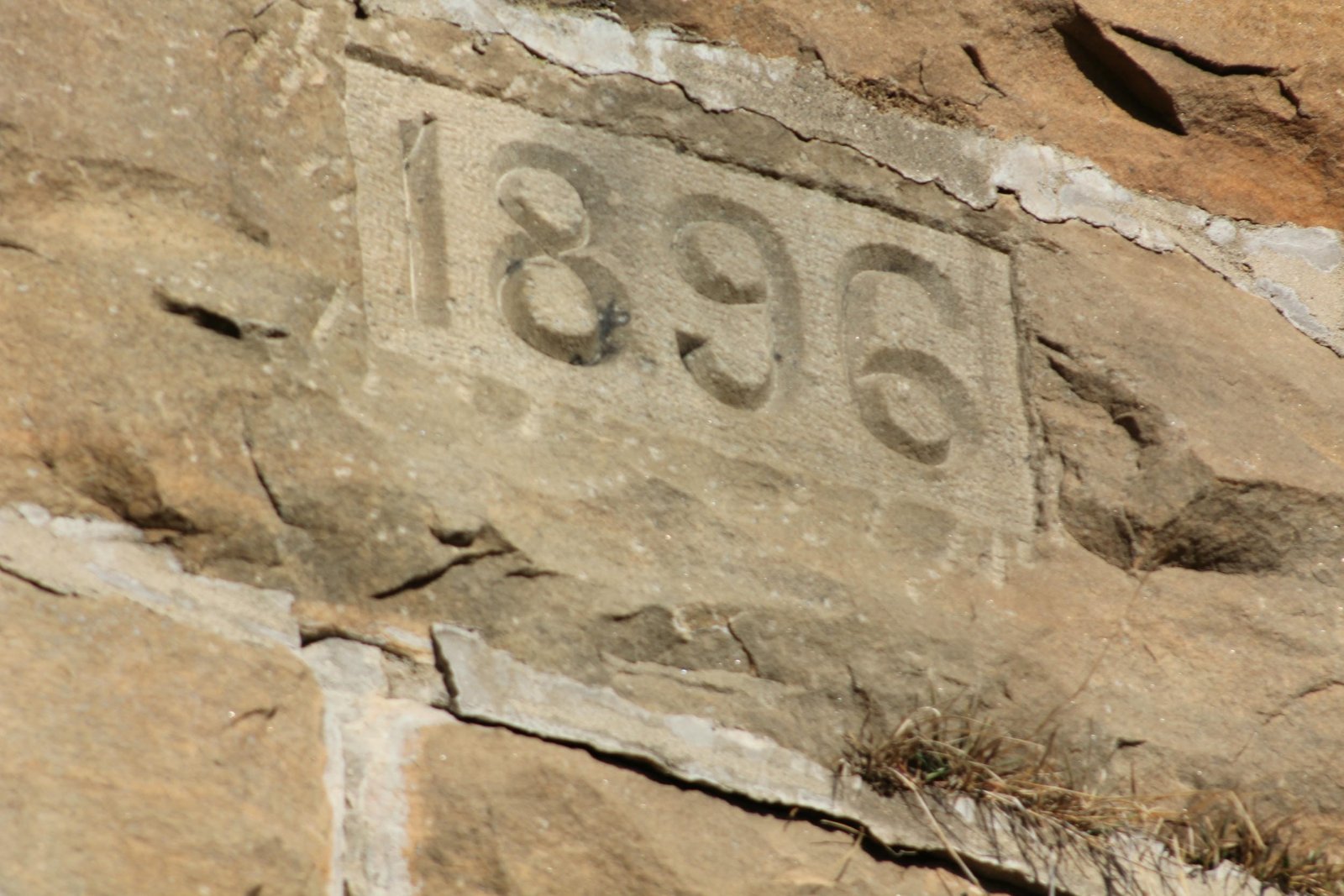 Date stone, west face